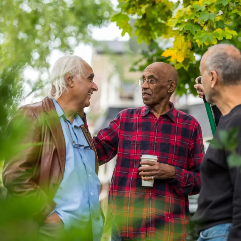 Neighbors talking over coffee