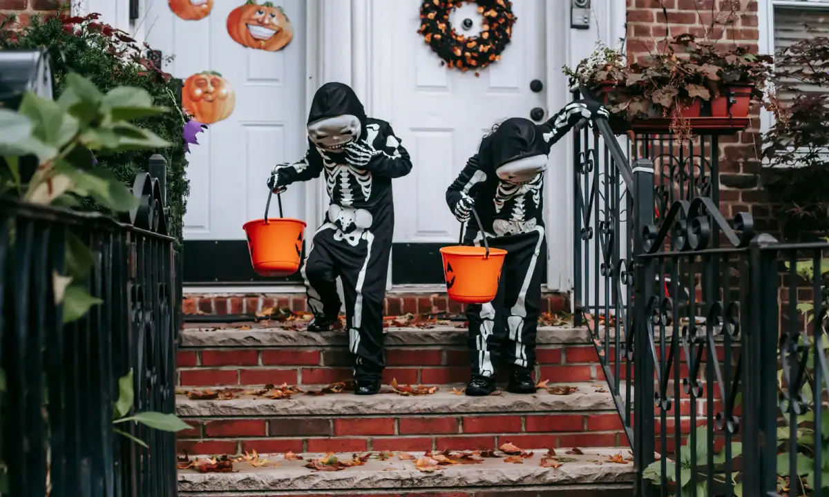 Neighbors enjoying a Halloween tradition outdoors